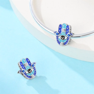 Detailed Hamsa Hand and Evil Eye charm bead in silver with blue enamel for bracelets