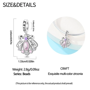 Detailed view of silver bow charm with pink zirconia and weight specifications