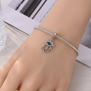 Bracciale a catena snake in argento con ciondolo occhio di Allah, luna e stelle
