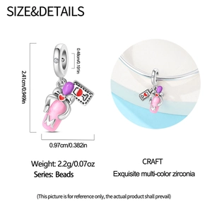 Detailed view of pink baby bottle charm with silver M initial and red heart bowtie