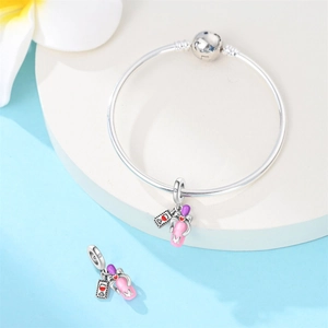 Silver bangle with blue star clasp featuring wine glass and letter M charms