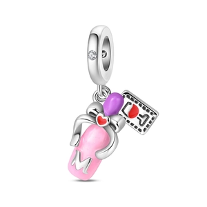 Close-up of pink enamel perfume bottle charm with silver letter M and red heart detail