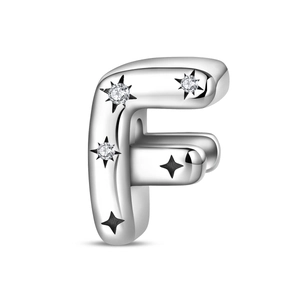 Detail of silver letter F charm bead with sparkling cubic zirconia and star engravings