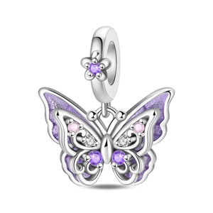Detailed view of silver butterfly charm with purple enamel and shimmering crystals