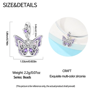 Macro detail showing dimensions of purple enamel butterfly charm with zircon stones