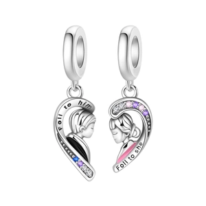 Polished silver heart puzzle charms for couples featuring boy and girl engravings