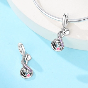 Detailed close-up of silver infinity charm with Forever engraving and heart tag
