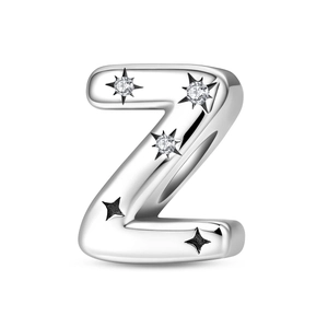 Detailed macro view of letter Z charm with sparkling star accents in silver finish