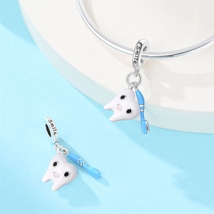 Silver tooth charm with blue toothbrush and Smile engraving for DIY bracelets