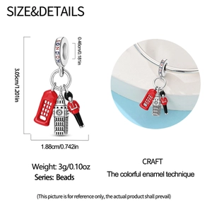 Detailed view of silver London charm with Big Ben, red phone booth and guard pendant