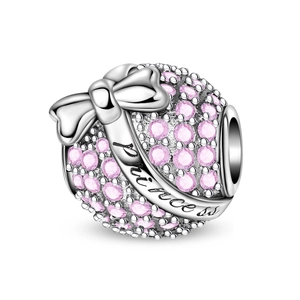 Macro view of silver charm bead with pink pavé crystals and Princess bow engraving