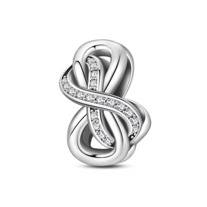 Detail of silver knot charm with sparkling pavé cubic zirconia for DIY bracelets