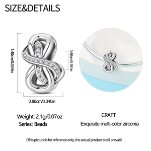 Detail view of silver infinity charm bead with zirconia inlay and dimensions 1.40x0.86cm
