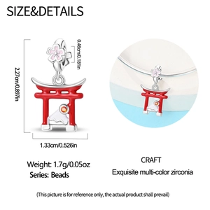 Detailed view of silver Torii charm with cherry blossom and Fuji motif measuring 2.27cm