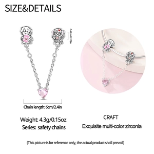 Detail view of silver boy and girl safety chain with pink zircon heart for bracelets
