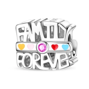 Close-up of Family Forever silver bead charm with pink gemstone and heart enamel details