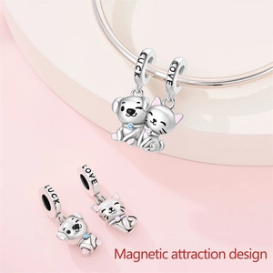 Magnetic cat and dog couple charms in silver with blue and pink rhinestones
