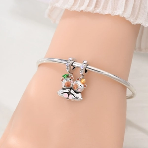 Silver charm bracelet with cartoon hugging animals and colorful enamel pendants