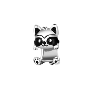 Detailed macro view of a silver raccoon charm with black enamel details for bracelets