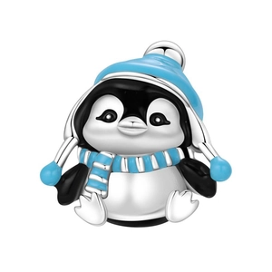Detailed view of a cute cartoon penguin charm with blue enamel hat and silver finish