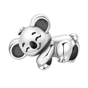 Detailed close-up of a sleeping koala charm in silver with black enamel details for bracelets