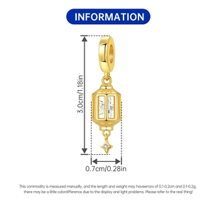 Detail view of a gold lantern pendant with star crystal and dimensions of 3.0cm height