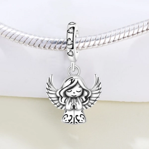Detail of silver angel charm with praying hands and wings on a snake chain bracelet