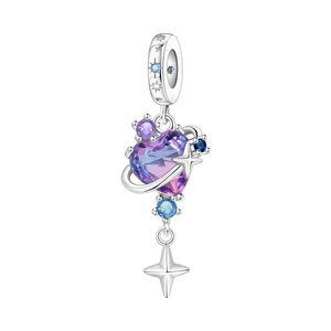 Macro view of silver tarot star charm with gradient heart crystal for bracelets