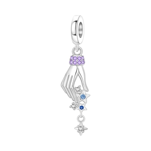 Detailed view of silver hand charm with purple cubic zirconia and hanging blue stars
