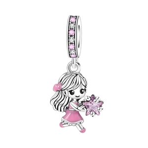 Macro view of silver girl charm with pink enamel bow and sparkling star zircon
