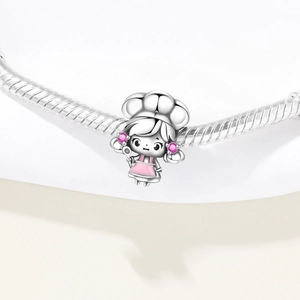 Silver chef girl charm with pink apron and spoon on snake chain for charm bracelets