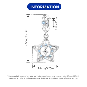 Detailed view of silver star charm with blue and white zircon for charm bracelets