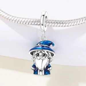 Detailed view of silver wizard charm with blue enamel on a snake chain bracelet