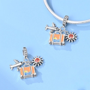 Travel charms set featuring silver airplane, orange suitcase and sun pendant for DIY bracelets