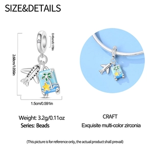 Close-up of travel plane and blue suitcase charm with dimensions and wrist styling