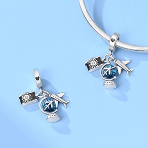 Detailed travel charms with airplane, camera and globe on a silver bracelet band