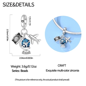 Detailed size view of silver travel charm with blue globe, camera and airplane