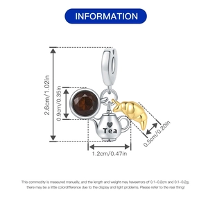Detailed size specifications for silver teapot and croissant charms with brown gemstone