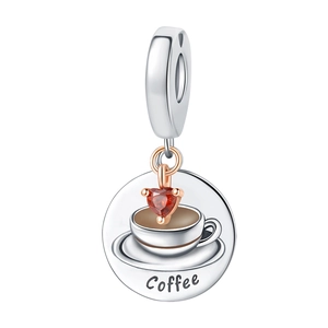 Detail of coffee charm with white cup, red heart gem and Coffee engraving in silver