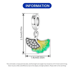 Detailed size chart showing dimensions of the ginkgo leaf charm with zircon and green enamel