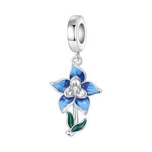 Macro shot of blue enamel iris charm with silver plating and sparkling center zircon