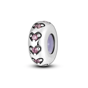 Macro detail of silver charm bead with pink heart stones and enamel outlines