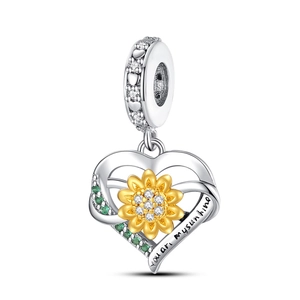 Close-up of heart charm with sunflower and engraved 'you are my sunshine' text