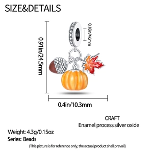 Detailed view showing dimensions of silver squirrel acorn and maple leaf charm