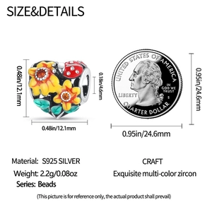 Detailed size comparison of a heart sunflower charm next to a US quarter coin