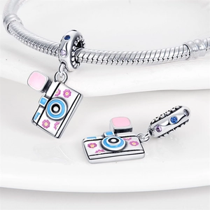 Silver camera charm bead with colorful enamel flowers and evil eye detail for bracelet