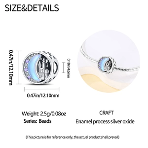 Detailed view of silver moon castle charm with blue enamel and purple zircon stones