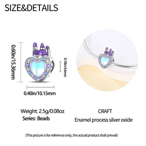 Detailed view of silver heart charm with purple castle and mother of pearl inlay
