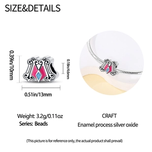 Detail view of unicorn bead dimensions and styling on a silver snake chain bracelet