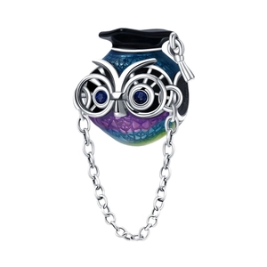 Silver owl charm with graduation cap and blue crystal eyes in colorful gradient enamel